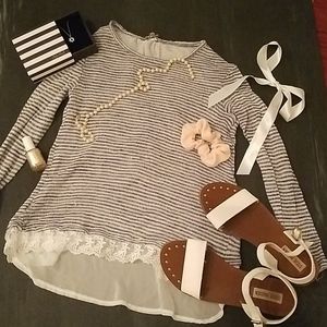 Adorable grey and white striped blouse.